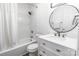 Bright bathroom with white vanity, modern fixtures, and shower-tub combo at 338 Orchard Trace Ln # 8, Charlotte, NC 28213