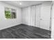 Spacious bedroom with large closet, neutral walls, and a window providing natural light at 338 Orchard Trace Ln # 8, Charlotte, NC 28213