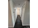 Clean hallway with sleek floors and a linen closet at 338 Orchard Trace Ln # 8, Charlotte, NC 28213