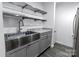 Renovated kitchen featuring stainless steel appliances and countertops at 338 Orchard Trace Ln # 8, Charlotte, NC 28213