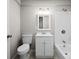 Clean bathroom features a shower-tub combo, modern vanity, and updated fixtures at 346 Fieldstone Cir, Statesville, NC 28677