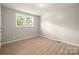 Sunny bedroom with new flooring and neutral paint, perfect for relaxation at 346 Fieldstone Cir, Statesville, NC 28677