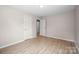 Spacious bedroom features new flooring, neutral paint, and closet at 346 Fieldstone Cir, Statesville, NC 28677