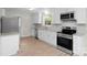 Modern kitchen with new cabinets, stainless steel appliances, and granite countertops at 346 Fieldstone Cir, Statesville, NC 28677