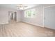 Spacious living room with new floors and neutral walls at 346 Fieldstone Cir, Statesville, NC 28677