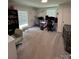Spacious bedroom providing ample space, natural light, and neutral carpeting at 512 S Gray St, Gastonia, NC 28052