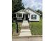 Charming home with classic details, a welcoming front porch, and a well-manicured lawn at 512 S Gray St, Gastonia, NC 28052