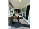 Cozy front porch area with comfortable seating and stylish black shutters at 512 S Gray St, Gastonia, NC 28052