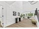 Elegant foyer leading to the living room with hardwood floors, trim details and staircase at 5217 Waterfall Ct, Gastonia, NC 28056
