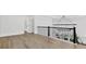 Upstairs hallway with modern lighting and elegant black metal banister at 5217 Waterfall Ct, Gastonia, NC 28056