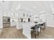 Modern kitchen with a double island, stainless steel appliances, white cabinetry and pendant lighting at 5217 Waterfall Ct, Gastonia, NC 28056