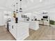 Open concept kitchen and living room with modern design, island and stainless steel appliances at 5217 Waterfall Ct, Gastonia, NC 28056