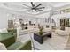 Open floor plan featuring modern living room with staircase and stylish kitchen, perfect for entertaining at 5217 Waterfall Ct, Gastonia, NC 28056