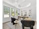 Bright office features a tray ceiling, built-in shelving, and multiple windows at 5217 Waterfall Ct, Gastonia, NC 28056