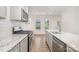 Stylish kitchen with stainless steel appliances and granite countertops at 530 E 9Th St, Charlotte, NC 28202