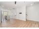 Bright open-concept living space with hardwood floors and recessed lighting at 530 E 9Th St, Charlotte, NC 28202
