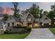 Beautiful brick home with a well-manicured lawn and professional landscaping at 5638 Timber Ln, Charlotte, NC 28270