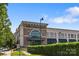 Whole Foods Market storefront with a modern brick facade and ample parking at 5638 Timber Ln, Charlotte, NC 28270