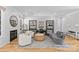 Cozy living room with fireplace, hardwood floors, and stylish decor at 5638 Timber Ln, Charlotte, NC 28270