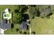 Aerial view of property featuring a pool, lush trees, expansive green lawn, and a well-maintained residence at 628 Stamie Dr, Chester, SC 29706