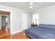 Bedroom with hardwood floors, neutral paint, and a window for natural light at 628 Stamie Dr, Chester, SC 29706