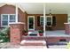 Charming brick home with a covered front porch, perfect for enjoying the outdoors at 628 Stamie Dr, Chester, SC 29706