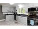 Classic kitchen featuring light cabinetry, stainless steel appliances, and ample counter space at 628 Stamie Dr, Chester, SC 29706