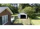 View of detached garage with gated yard space at 628 Stamie Dr, Chester, SC 29706