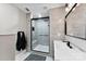 Contemporary bathroom featuring a glass enclosed shower, tiled walls, and modern fixtures at 7144 Marlin St, Gastonia, NC 28056
