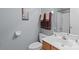 Clean bathroom with modern fixtures, a wooden vanity, and fresh towels enhancing the space at 7212 Morsey Ct, Charlotte, NC 28269