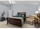 Cozy bedroom featuring a large bed, with a ceiling fan and bedside furniture at 7212 Morsey Ct, Charlotte, NC 28269