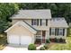 Beautiful two-story home with a two-car garage and landscaped front yard at 7212 Morsey Ct, Charlotte, NC 28269