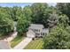 Aerial view of a two-story home with a two-car garage and landscaped yard at 7212 Morsey Ct, Charlotte, NC 28269