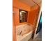 Bathroom featuring a soaking tub and decorative accents and fixtures at 7267 Sandown Ct, Harrisburg, NC 28075