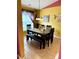 Well-lit dining room with tile floor and a dining table at 7267 Sandown Ct, Harrisburg, NC 28075