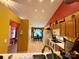 Open kitchen with tile floors, wooden cabinets, and view into the dining room at 7267 Sandown Ct, Harrisburg, NC 28075