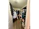 Spacious walk-in closet provides ample storage space for clothing and accessories at 7267 Sandown Ct, Harrisburg, NC 28075