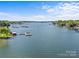 Expansive lake view showcasing numerous boat docks and deep water access for boaters at 7845 Village Harbor Dr, Cornelius, NC 28031