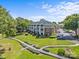 Aerial view of building and landscaped grounds at 7845 Village Harbor Dr, Cornelius, NC 28031