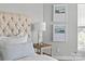 Bedroom features a side table with lamp and two small paintings at 7845 Village Harbor Dr, Cornelius, NC 28031