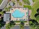 Overhead view of outdoor pool area with lounge chairs, landscaping, and nearby covered seating at 7845 Village Harbor Dr, Cornelius, NC 28031