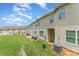 A view of the green backyard of the property at 8953 Bradstreet Commons Way, Charlotte, NC 28215