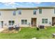 Expansive backyard features lush green grass and air conditioning units at 8953 Bradstreet Commons Way, Charlotte, NC 28215