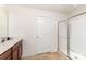 Bathroom features a modern vanity and a sleek, glass-enclosed shower at 8953 Bradstreet Commons Way, Charlotte, NC 28215