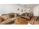 Cozy living room showcases comfortable seating and a stylish round coffee table at 8953 Bradstreet Commons Way, Charlotte, NC 28215