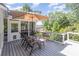 Deck with outdoor seating, umbrella, and bar area, perfect for entertaining at 905 Mangionne Dr, Matthews, NC 28105