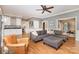 Elegant living room with a grey sofa and hardwood floors at 905 Mangionne Dr, Matthews, NC 28105