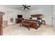 Spacious main bedroom with king bed, dresser, and ensuite bathroom at 905 Mangionne Dr, Matthews, NC 28105