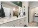 Bright bathroom with double sinks, white cabinets and granite countertops for a modern, clean feel at 9274 Dunwich Dr, Gastonia, NC 28056