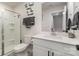 Modern bathroom featuring a sleek glass shower and a stylish vanity with an undermount sink at 9274 Dunwich Dr, Gastonia, NC 28056